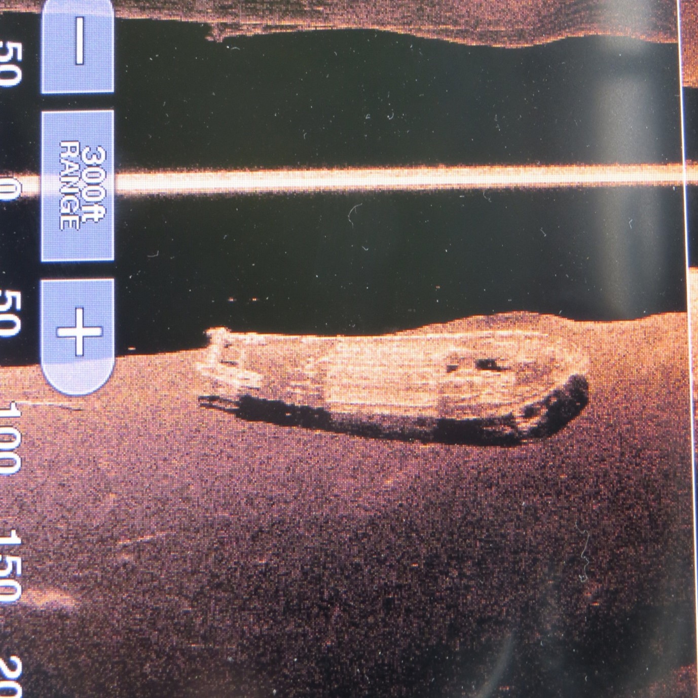 A side scan sonar image showing the outline of the hull of the Bonnington resting on the bottom of Upper Arrow Lake.