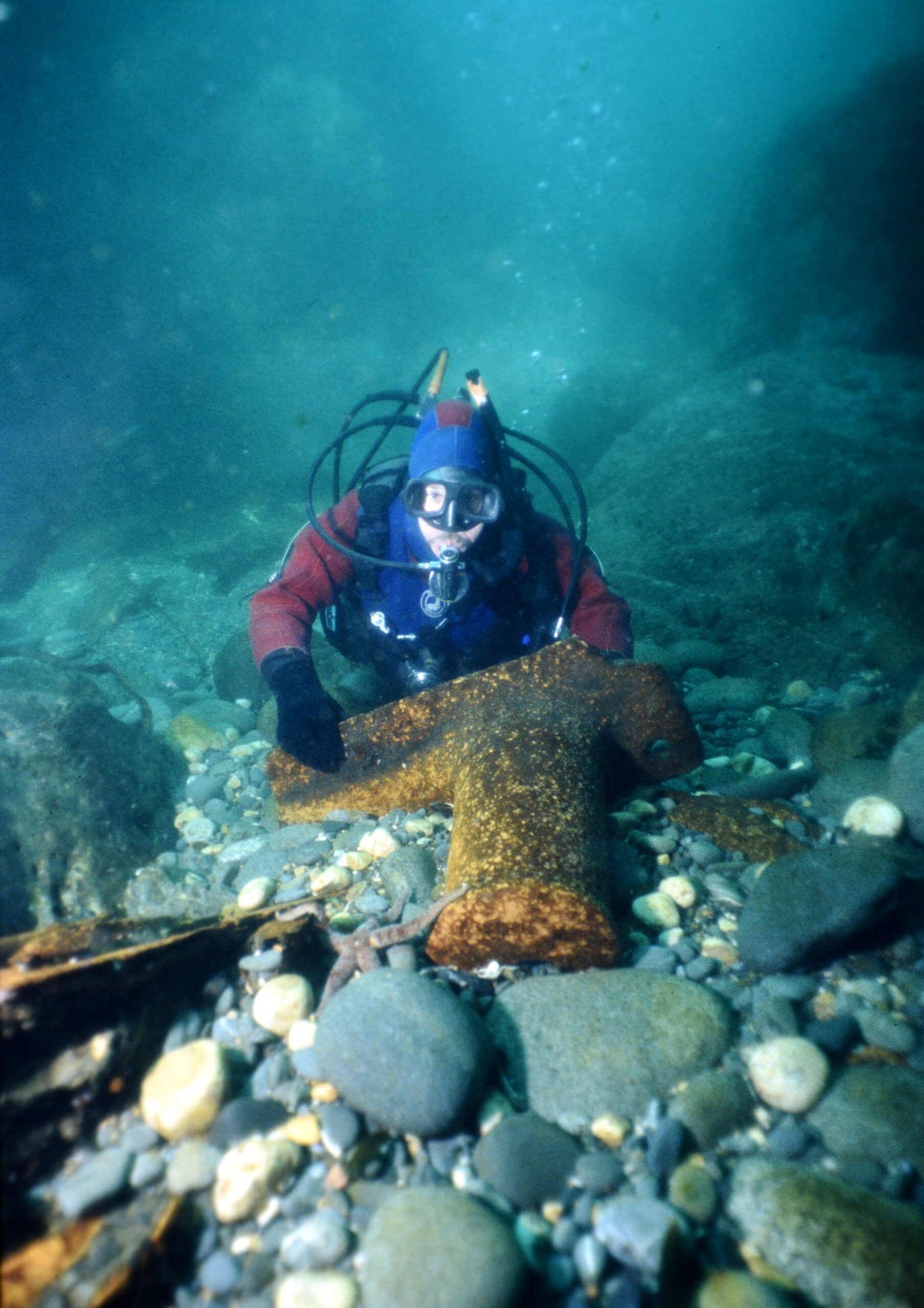 A UASBC diver poses next to a bollard from the Pass of Melfort