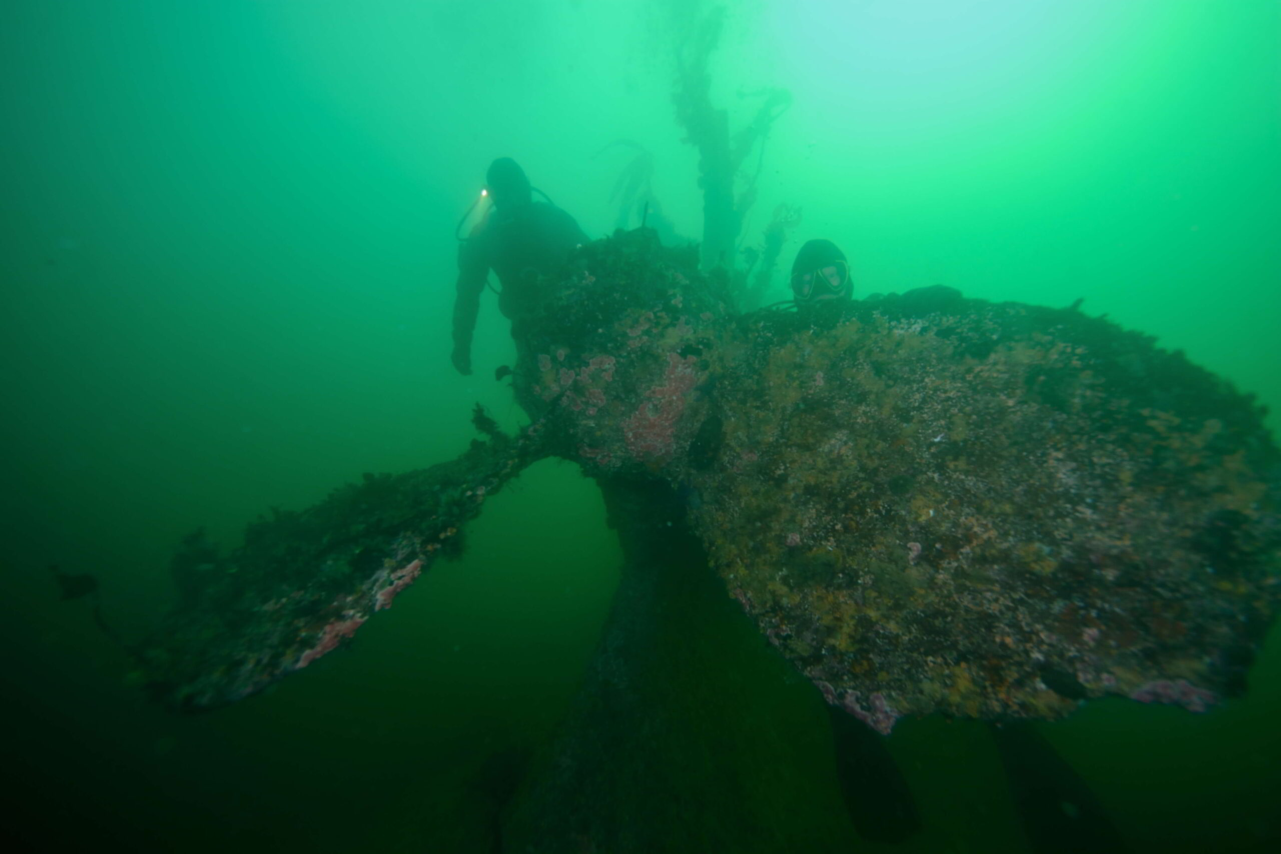 UASBC divers hoover next to the propellor of the Point Grey