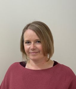 Woman wearing a red sweater