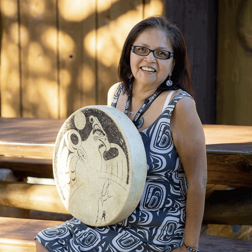 Woman holding a drum