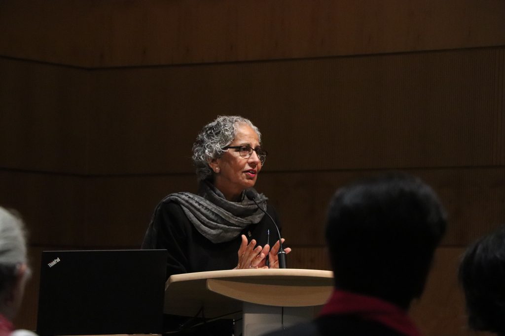 Person lecturing at a podium